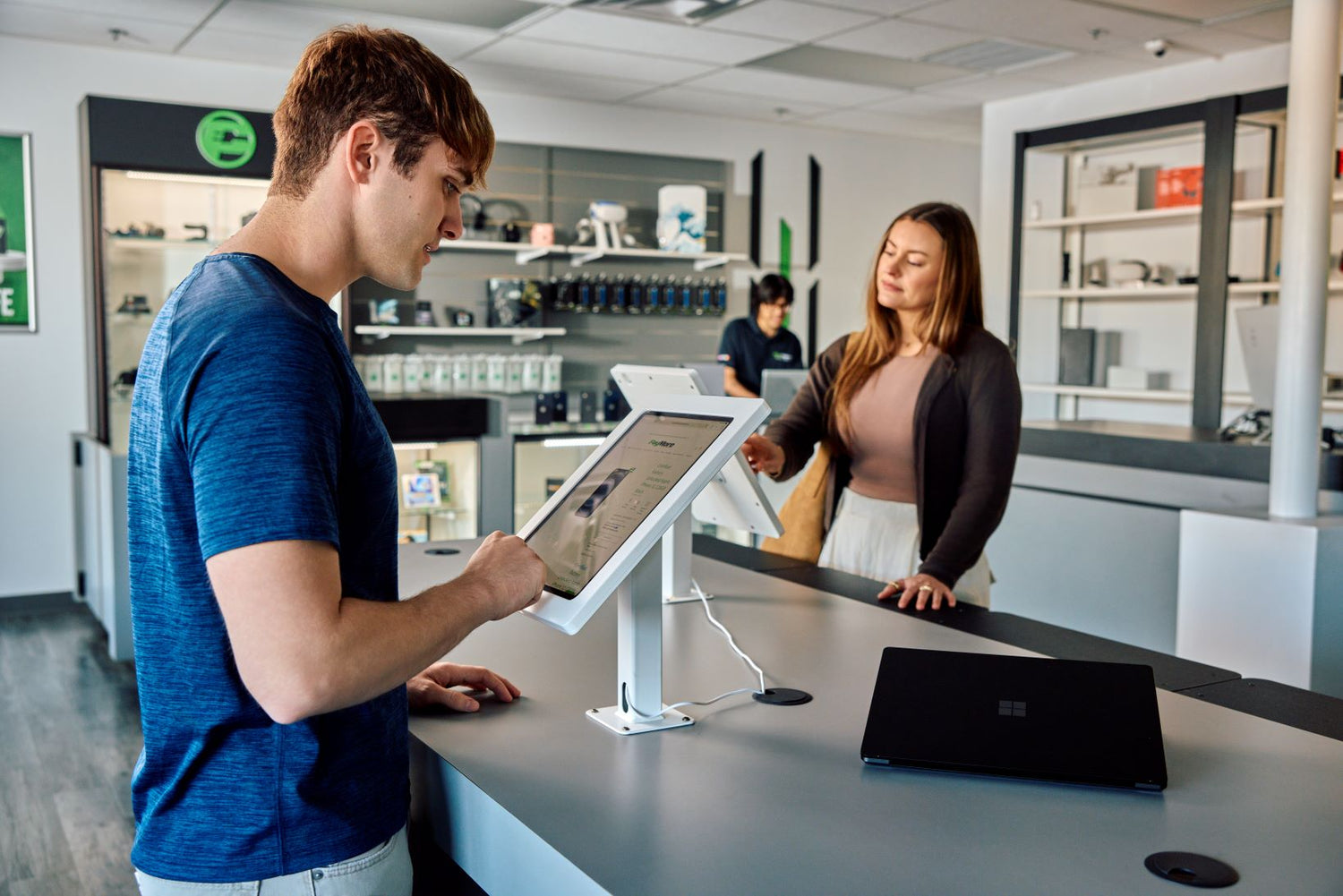 customers shopping at PayMore